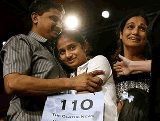 Kavya with her parents